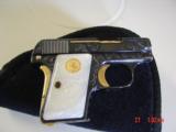 Colt 1908,25 cal,Vest Pocket,fully engraved by Flannery,refinished blue & gold,Pearlite grips,made 1908,a work of art !! - 12 of 15