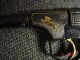 Colt Woodsman 1926 !! master engraved by Jim Sornberger,24k inlays,gold & silver rabbits,high gloss blued,6 1/2