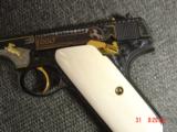 Colt Woodsman 1926 !! master engraved by Jim Sornberger,24k inlays,gold & silver rabbits,high gloss blued,6 1/2