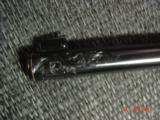 Colt Woodsman 1926 !! master engraved by Jim Sornberger,24k inlays,gold & silver rabbits,high gloss blued,6 1/2