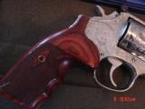 Smith & Wesson 686,no dash,fully engraved by Flannery,custom Rosewood grips,high polished stainless,4
