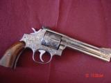 Smith & Wesson 686 no dash,deep relief Master Engraved by Terry Wallace,custom Rosewood grips,6
