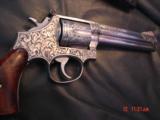 Smith & Wesson 686 no dash,deep relief Master Engraved by Terry Wallace,custom Rosewood grips,6