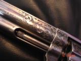 Smith & Wesson 686 no dash,deep relief Master Engraved by Terry Wallace,custom Rosewood grips,6