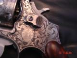 Smith & Wesson 686 no dash,deep relief Master Engraved by Terry Wallace,custom Rosewood grips,6