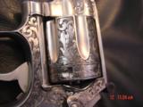 Smith & Wesson 686 no dash,deep relief Master Engraved by Terry Wallace,custom Rosewood grips,6