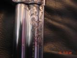 Smith & Wesson 686 no dash,deep relief Master Engraved by Terry Wallace,custom Rosewood grips,6