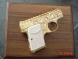 Browning Baby 25cal,Belgium,100%+ master engraved by Flannery,24K plated,white Browning grips,1965,in custom Oak case,a work of art !! - 2 of 15