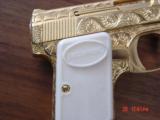 Browning Baby 25cal,Belgium,100%+ master engraved by Flannery,24K plated,white Browning grips,1965,in custom Oak case,a work of art !! - 5 of 15