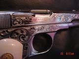 Colt 1903,32 acp,master scroll engraved by Santiago leis,refinished bright nickel,made 1921,faux Ivory grips,a real work of art,& certificate - 12 of 15