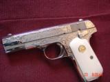 Colt 1903,32 acp,master scroll engraved by Santiago leis,refinished bright nickel,made 1921,faux Ivory grips,a real work of art,& certificate - 1 of 15