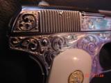 Colt 1903,32 acp,master scroll engraved by Santiago leis,refinished bright nickel,made 1921,faux Ivory grips,a real work of art,& certificate - 11 of 15