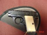 Browning Baby 25cal,master engraved by Santiago Leis,refinished in high gloss blue,bonded ivory grips,brass finger rest,1967,9.7oz,a work of art !! - 12 of 14