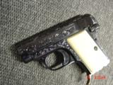 Browning Baby 25cal,master engraved by Santiago Leis,refinished in high gloss blue,bonded ivory grips,brass finger rest,1967,9.7oz,a work of art !! - 14 of 14