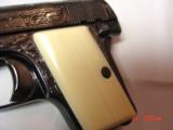 Browning Baby 25cal,master engraved by Santiago Leis,refinished in high gloss blue,bonded ivory grips,brass finger rest,1967,9.7oz,a work of art !! - 2 of 14