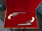 American Western Arms,Custom Engraved matched set,24k accents,birdhead frame,ivory grips,fitted wood case-45lc,5 1/2
