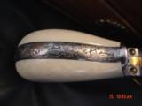American Western Arms,Custom Engraved matched set,24k accents,birdhead frame,ivory grips,fitted wood case-45lc,5 1/2