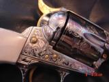 Colt SAA 2nd Gen.,45LC,fully engraved by Brian Mears,refinished nickel & 24K gold accents,real Ivory grips,4 3/4