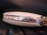 Colt SAA 2nd Gen.,45LC,fully engraved by Brian Mears,refinished nickel & 24K gold accents,real Ivory grips,4 3/4