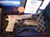 Colt Government Series 80,38 Super,Master engraved by S,Leis,refinished bright nickel with 24K gold accents,custom grips,2 mags,a work of art-awesome
- 8 of 15