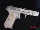 Colt 1903 hammerless,32 cal,master engraved by S.Leis,refinished nickel,1915,bonded ivory grips,awesome showpiece !! - 14 of 15