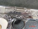Colt 1903 hammerless,32 cal,master engraved by S.Leis,refinished nickel,1915,bonded ivory grips,awesome showpiece !! - 10 of 15