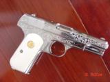Colt 1903 hammerless,32 cal,master engraved by S.Leis,refinished nickel,1915,bonded ivory grips,awesome showpiece !! - 2 of 15