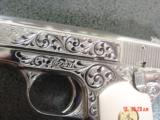 Colt 1903 hammerless,32 cal,master engraved by S.Leis,refinished nickel,1915,bonded ivory grips,awesome showpiece !! - 4 of 15