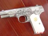 Colt 1903 hammerless,32 cal,master engraved by S.Leis,refinished nickel,1915,bonded ivory grips,awesome showpiece !! - 1 of 15
