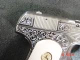 Colt 1903 hammerless,32 cal,master engraved by S.Leis,refinished nickel,1915,bonded ivory grips,awesome showpiece !! - 9 of 15