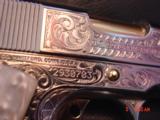 Colt Government 1911,38 Super,Master engraved by Santiago Leis,refinished bright nickel & 24K gold accents,Pearlite grips,awesome work of art
- 12 of 12