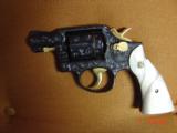 Smith & Wesson 10-5,38spl.fully engraved & reblued by Flannery Engraving,with 24K accents & gold inlay,2