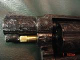 Smith & Wesson 10-5,38spl.fully engraved & reblued by Flannery Engraving,with 24K accents & gold inlay,2