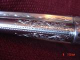 Ruger New Model Single Six 22lr,Master engraved by Clint Finley, very deep engraving,Real Stag horn grips,5 1/2