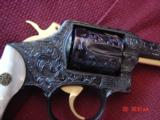 Smith & Wesson 10-7,fully engraved,& reblued with 24k accents by Flannery engraving,Pearlite grips,4",38spl.,awesome work of art !! - 5 of 15