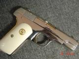 Colt 1903,32 Cal,hammerless,fully refinished in bright mirror nickel with 24K gold accents,& bonded ivory grips,made in 1919- awesome showpiece !! - 12 of 15