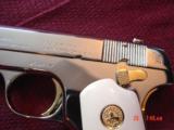 Colt 1903,32 Cal,hammerless,fully refinished in bright mirror nickel with 24K gold accents,& bonded ivory grips,made in 1919- awesome showpiece !! - 5 of 15