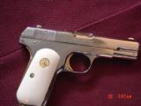 Colt 1903,32 Cal,hammerless,fully refinished in bright mirror nickel with 24K gold accents,& bonded ivory grips,made in 1919- awesome showpiece !! - 1 of 15