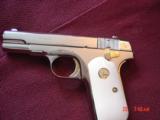Colt 1903,32 Cal,hammerless,fully refinished in bright mirror nickel with 24K gold accents,& bonded ivory grips,made in 1919- awesome showpiece !! - 4 of 15