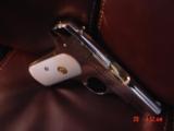 Colt 1903,32 Cal,hammerless,fully refinished in bright mirror nickel with 24K gold accents,& bonded ivory grips,made in 1919- awesome showpiece !! - 14 of 15