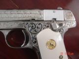 Colt 1903,32 cal,made 1920,master engraved by S.Leis,& refinished in bright mirror nickel,bonded ivory grips.awesome showpiece - 5 of 15