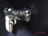 Colt 1903,32 cal,made 1920,master engraved by S.Leis,& refinished in bright mirror nickel,bonded ivory grips.awesome showpiece - 14 of 15