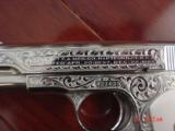 Colt 1903,32 cal,made 1920,master engraved by S.Leis,& refinished in bright mirror nickel,bonded ivory grips.awesome showpiece - 6 of 15