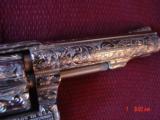 Smith & Wesson 10-6 38SPL 4" fully refinished in bright nickel & engraved by Flannery Engraving,Pearlite grips,1 of a kind work of art & certific - 7 of 15