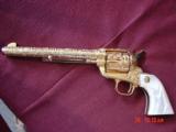Colt SAA 3rd Gen,44-40,7 1/2",fully master cattlebrand engrave,24K gold plated,real MOP heavy grips,1982,a 1 of a kind work of art,from Flannery
- 1 of 15