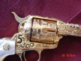 Colt SAA 3rd Gen,44-40,7 1/2",fully master cattlebrand engrave,24K gold plated,real MOP heavy grips,1982,a 1 of a kind work of art,from Flannery
- 3 of 15