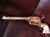 Colt SAA 3rd Gen,44-40,7 1/2",fully master cattlebrand engrave,24K gold plated,real MOP heavy grips,1982,a 1 of a kind work of art,from Flannery
- 15 of 15