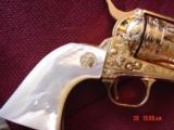 Colt SAA 3rd Gen,44-40,7 1/2",fully master cattlebrand engrave,24K gold plated,real MOP heavy grips,1982,a 1 of a kind work of art,from Flannery
- 2 of 15