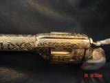 Colt SAA 3rd Gen,44-40,7 1/2",fully master cattlebrand engrave,24K gold plated,real MOP heavy grips,1982,a 1 of a kind work of art,from Flannery
- 10 of 15