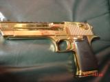 Magnum Research Desert Eagle 50AE,in the rare bright Titanium gold,6", a real showpiece hand cannon,never fired,in case with all papers & DVD,MK
- 4 of 15